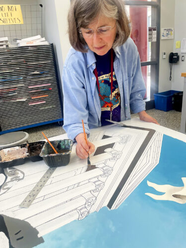 Creating history: AAHS students, teachers paint mural depicting iconic images of city